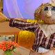 Illustration for article titled 'I Was One Of Several People Duped,' Manti Te'o Tells Scarecrow Dressed As Katie Couric